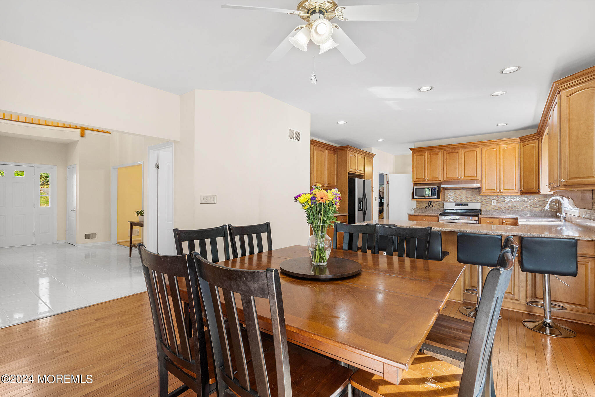 276 Nottingham Road Morganville, NJ 07751 - Photo 12 of 55 a view of a dining room with furniture window and wooden floor