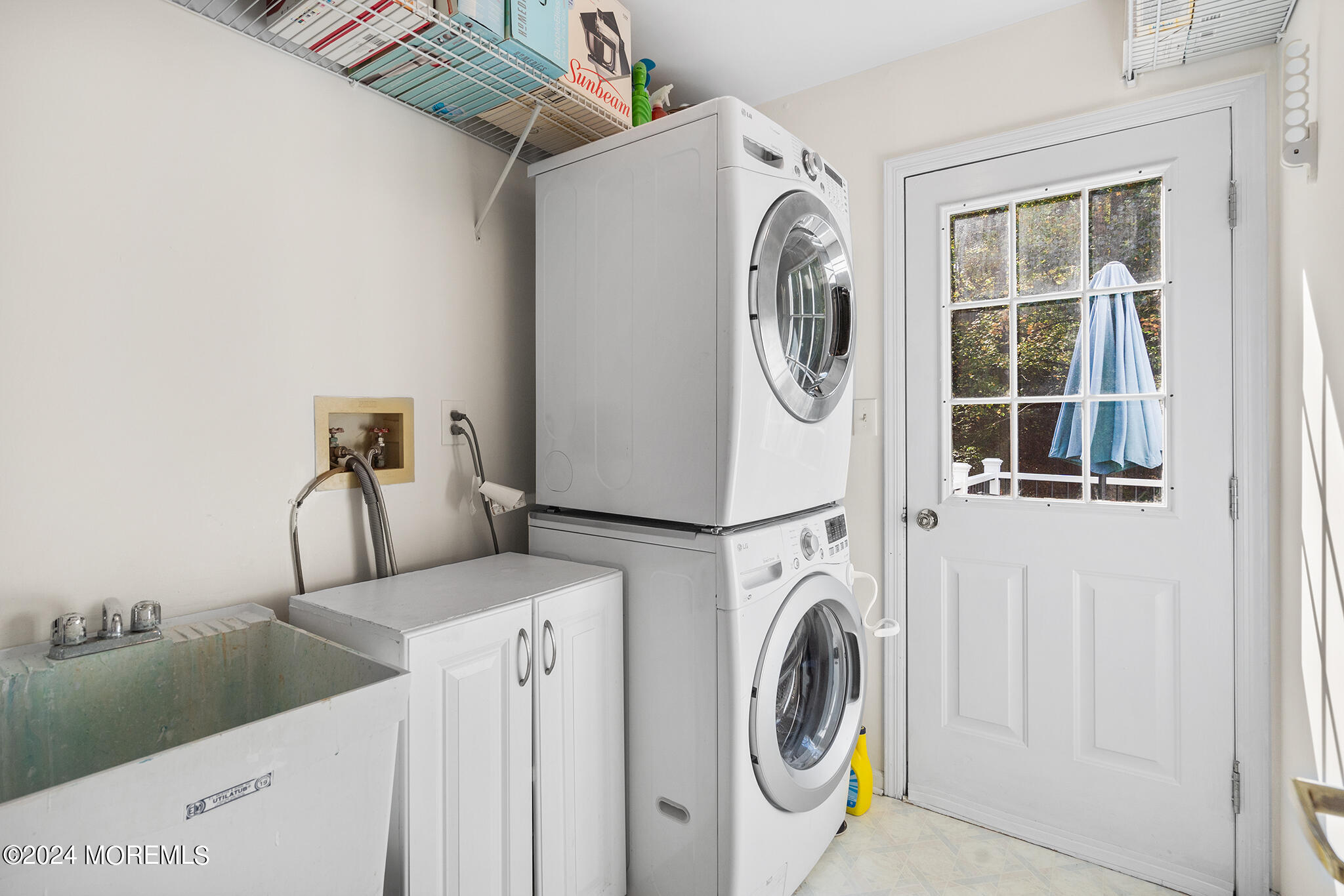 276 Nottingham Road Morganville, NJ 07751 - Photo 19 of 55 a utility room with dryer and washer