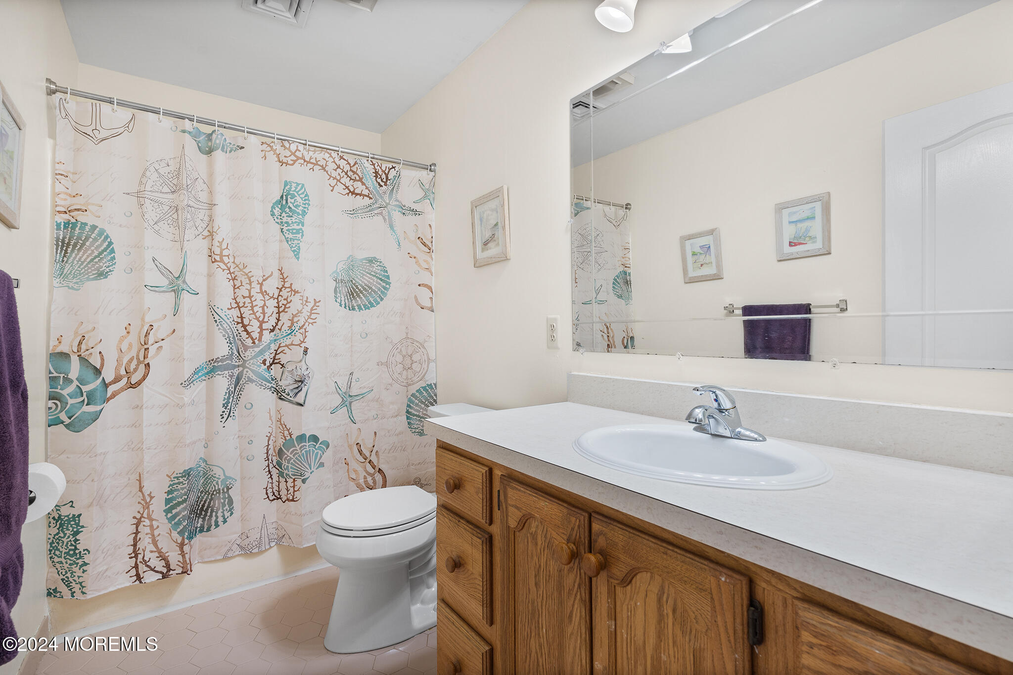 276 Nottingham Road Morganville, NJ 07751 - Photo 27 of 55 a bathroom with a sink toilet and shower