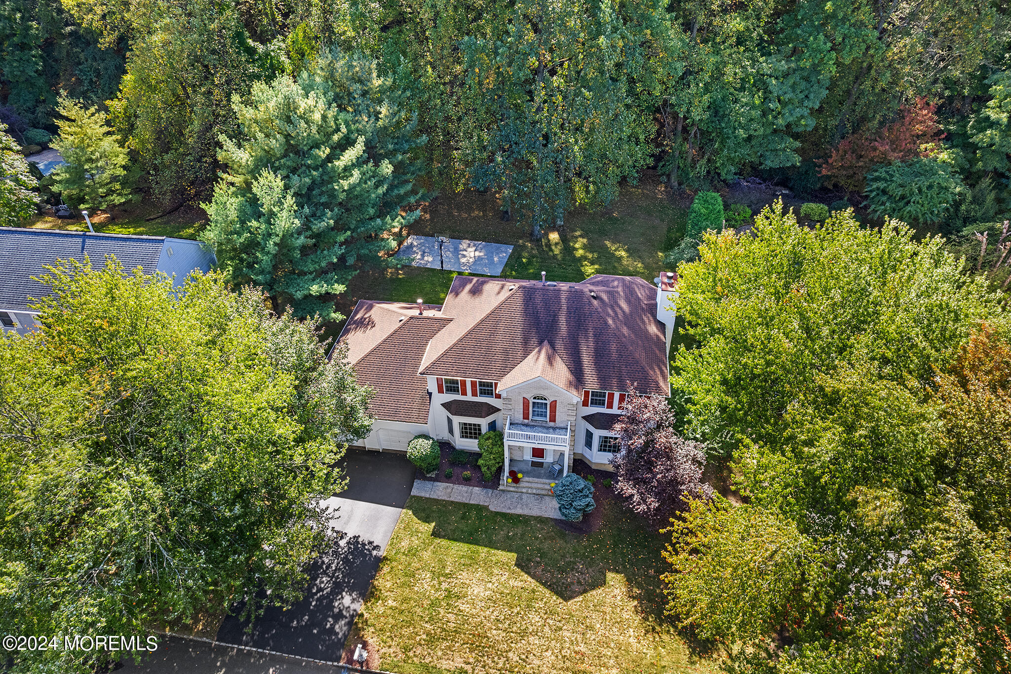 276 Nottingham Road Morganville, NJ 07751 - Photo 3 of 55 an aerial view of a house with swimming pool a yard and a large tree