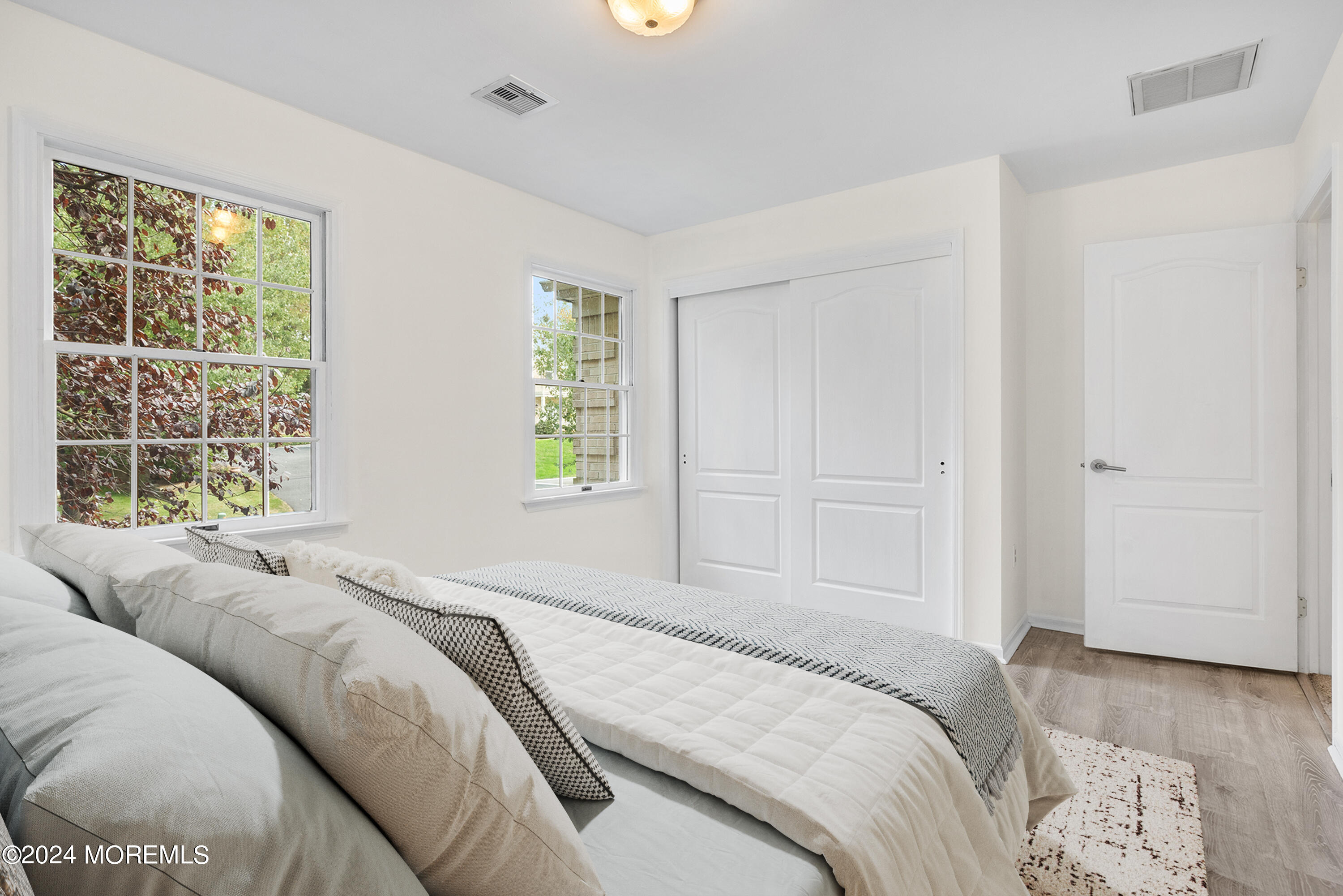 276 Nottingham Road Morganville, NJ 07751 - Photo 32 of 55 a bedroom with a bed and a window
