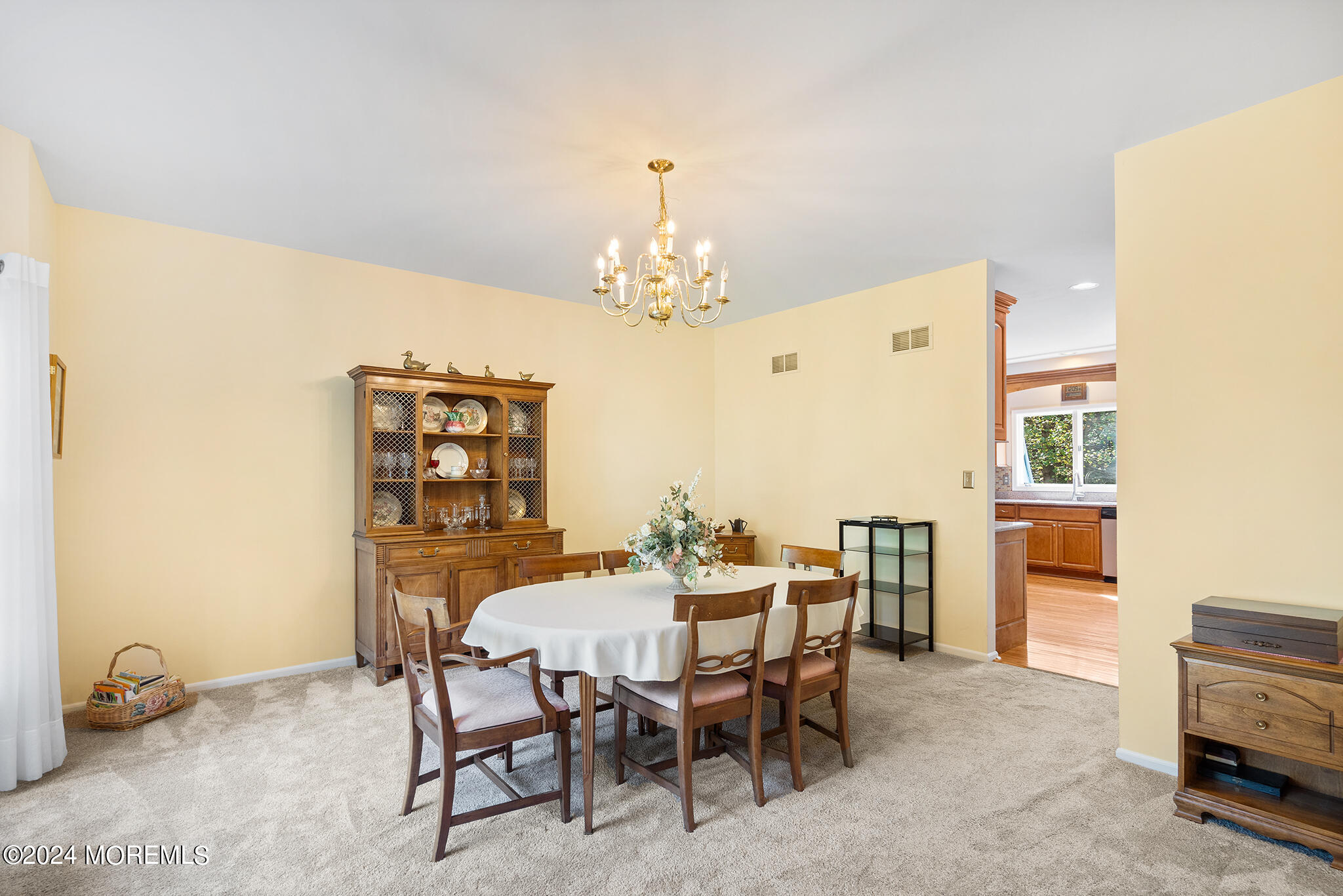276 Nottingham Road Morganville, NJ 07751 - Photo 6 of 55 a view of a dining room with furniture and chandelier