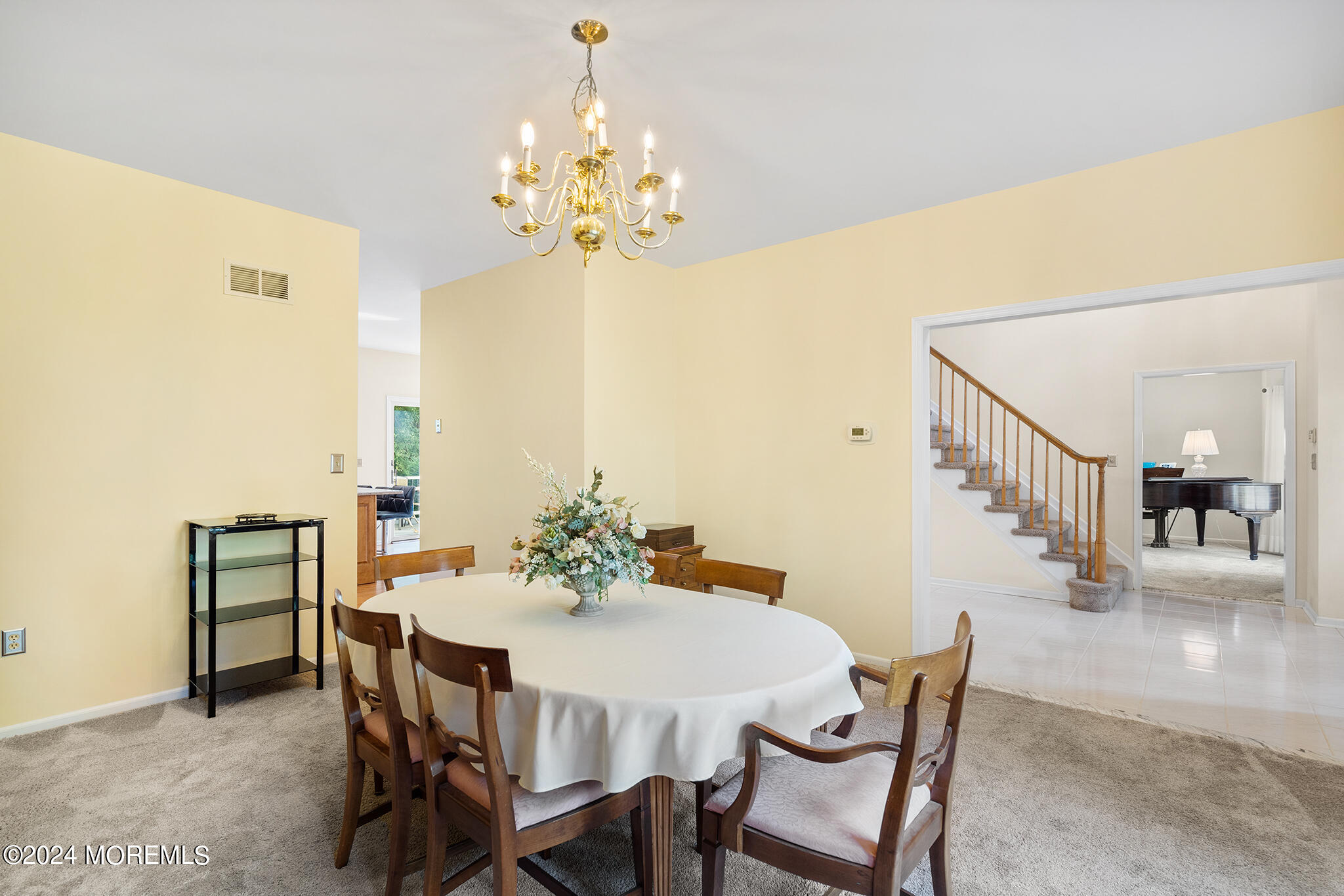 276 Nottingham Road Morganville, NJ 07751 - Photo 7 of 55 a view of a dining room with furniture and chandelier