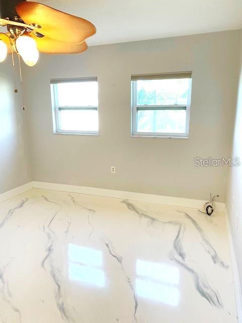 1 Boca Ciega Point Boulevard, Unit 115 St. Petersburg, FL 33708 - Photo 16 of 35 a bathroom with a bathtub and a shower