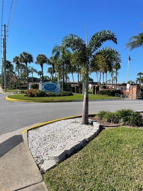1 Boca Ciega Point Boulevard, Unit 115 St. Petersburg, FL 33708 - Photo 2 of 35 a view of a park with palm trees