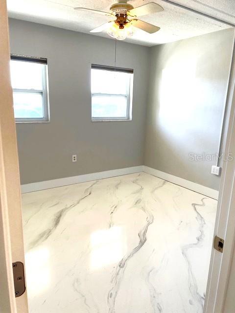 1 Boca Ciega Point Boulevard, Unit 115 St. Petersburg, FL 33708 - Photo 25 of 35 a view of empty room with window