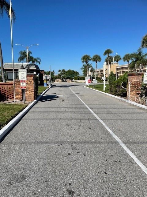 1 Boca Ciega Point Boulevard, Unit 115 St. Petersburg, FL 33708 - Photo 3 of 35 a view of street with cars