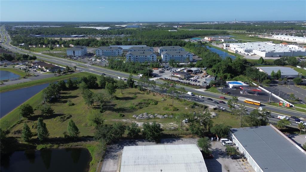 6347 Narcoossee Road Orlando, FL 32822 - Photo 11 of 17 an aerial view of multiple house