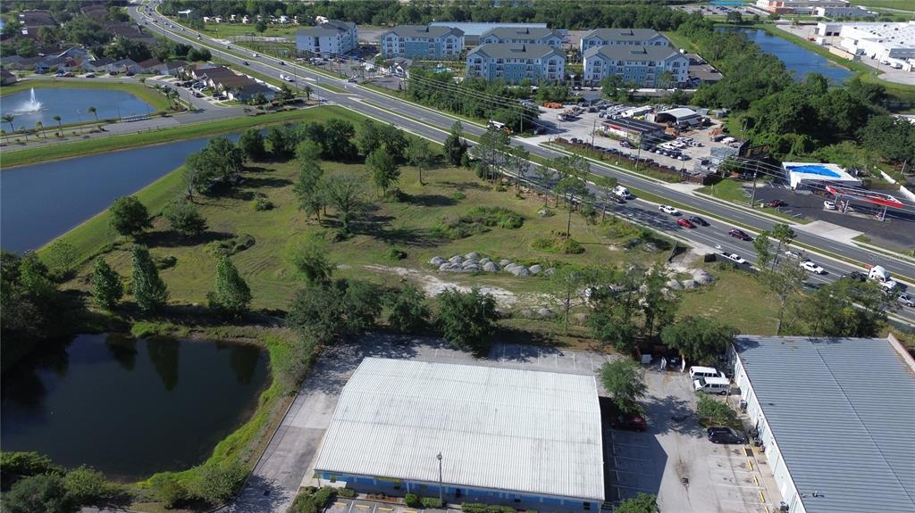 6347 Narcoossee Road Orlando, FL 32822 - Photo 10 of 17 an aerial view of a city