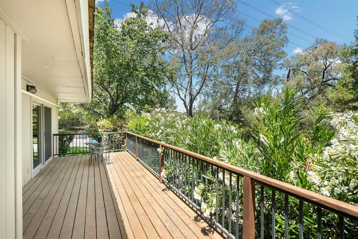 23030 Stonebridge Cupertino, CA 95014 - Photo 24 of 26 a view of balcony with wooden floor