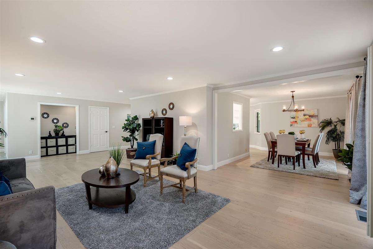 23030 Stonebridge Cupertino, CA 95014 - Photo 6 of 26 a living room with furniture and a table
