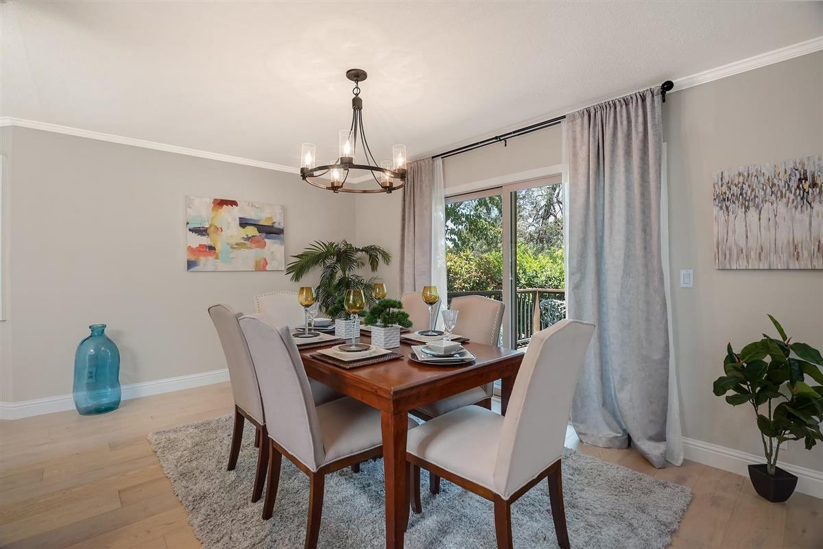23030 Stonebridge Cupertino, CA 95014 - Photo 7 of 26 a view of a dining room with furniture window and outside view