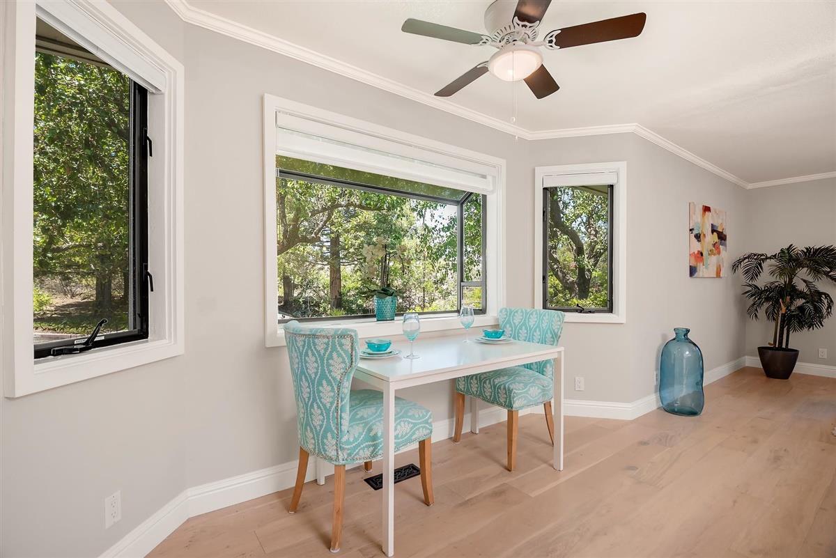 23030 Stonebridge Cupertino, CA 95014 - Photo 10 of 26 a view of a dining room with furniture window and outside view