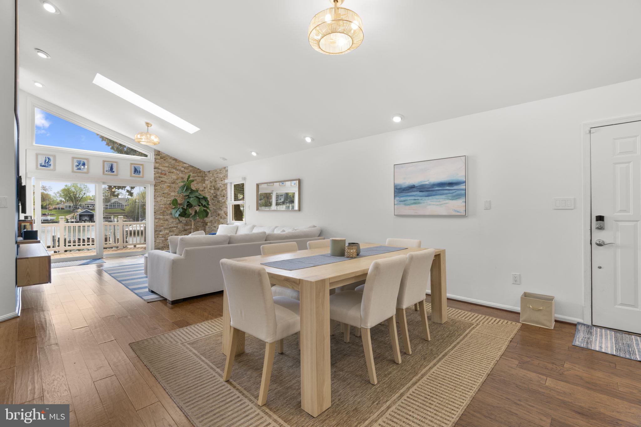 25 Leeland Road Edgewater, MD 21037 - Photo 4 of 48 a dining room with wooden floor and large windows