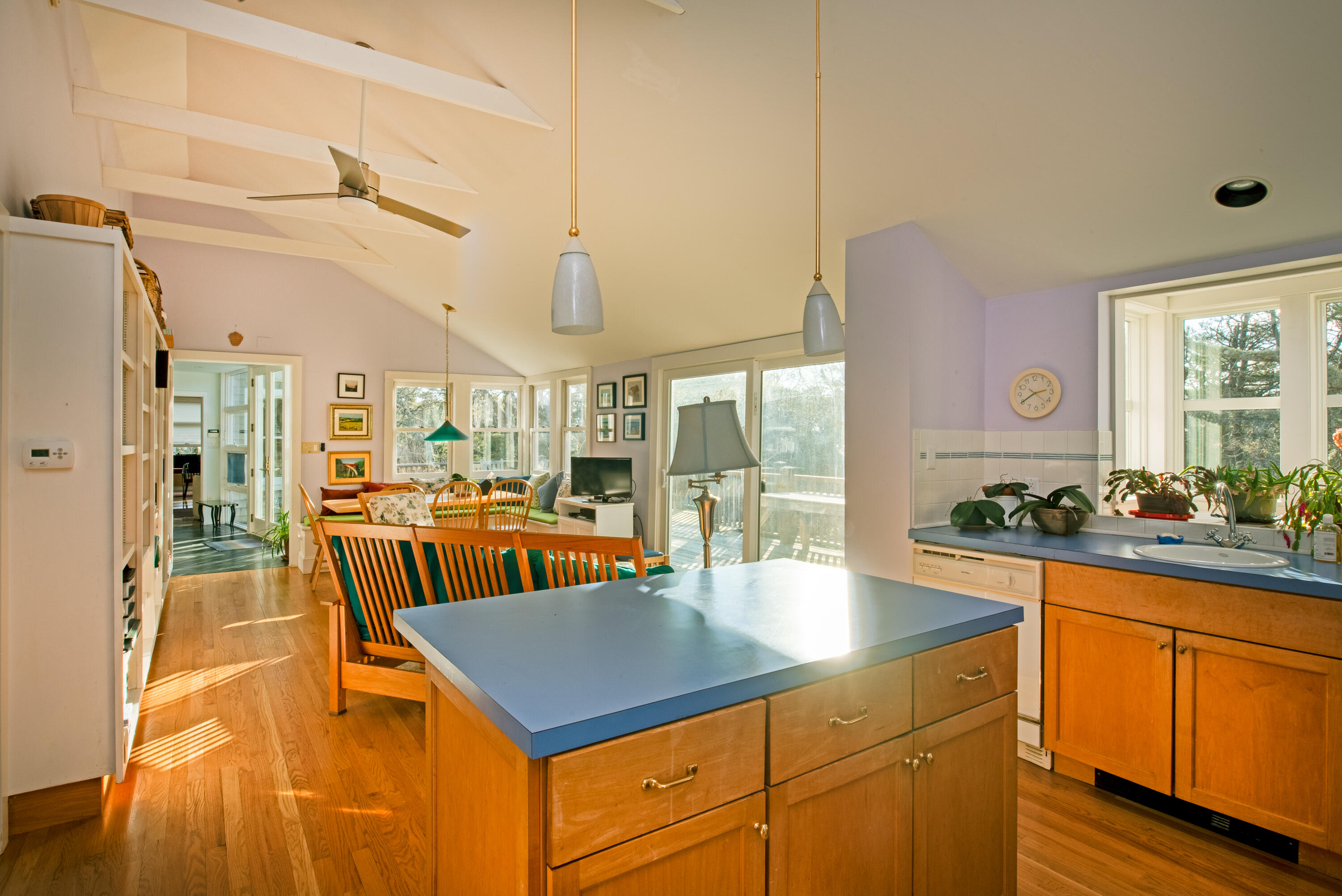 80 Shurtleff Road Eastham, MA 02642 - Photo 11 of 34 a kitchen with stainless steel appliances granite countertop a table and chairs in it