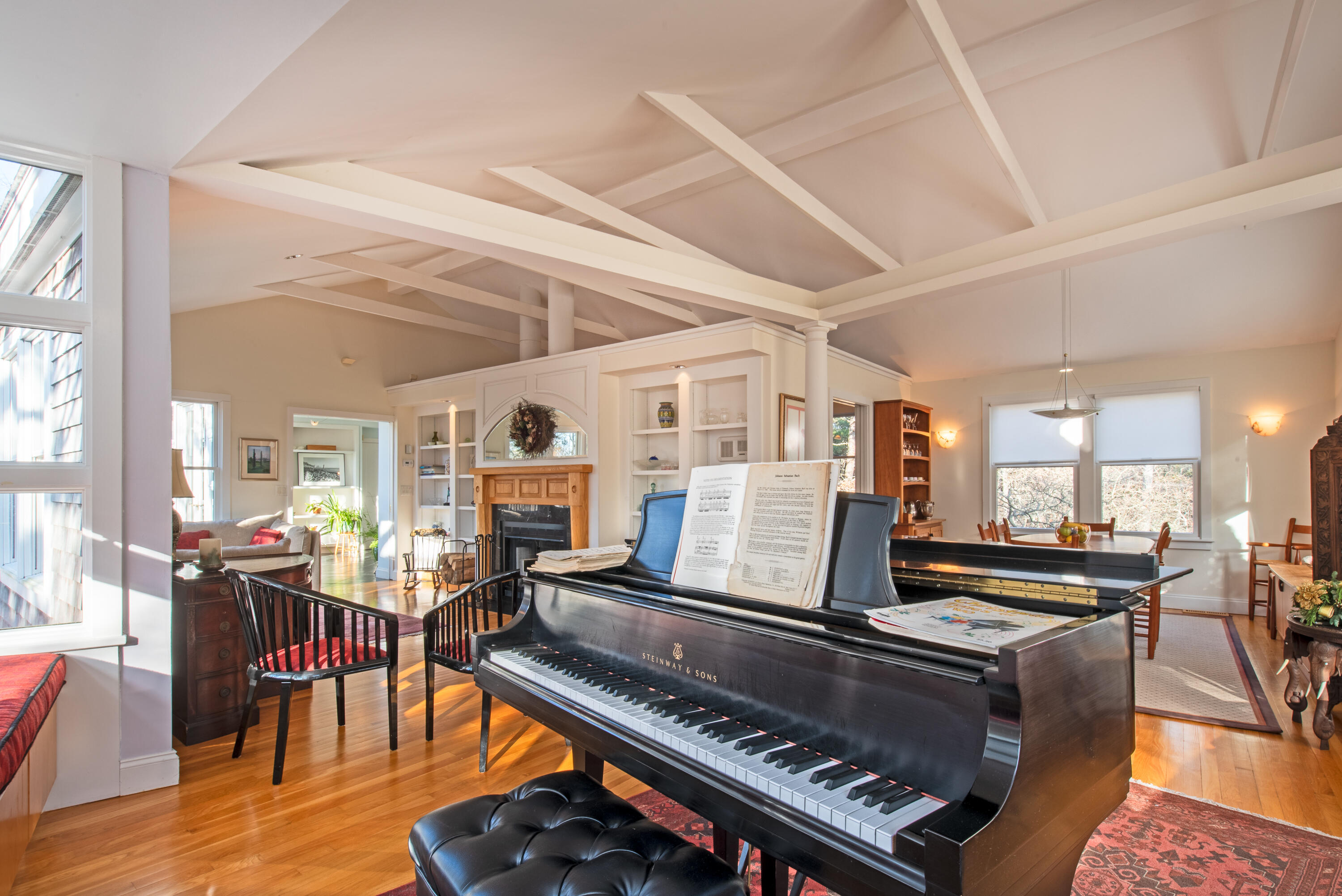 80 Shurtleff Road Eastham, MA 02642 - Photo 20 of 34 a living room with furniture and a piano