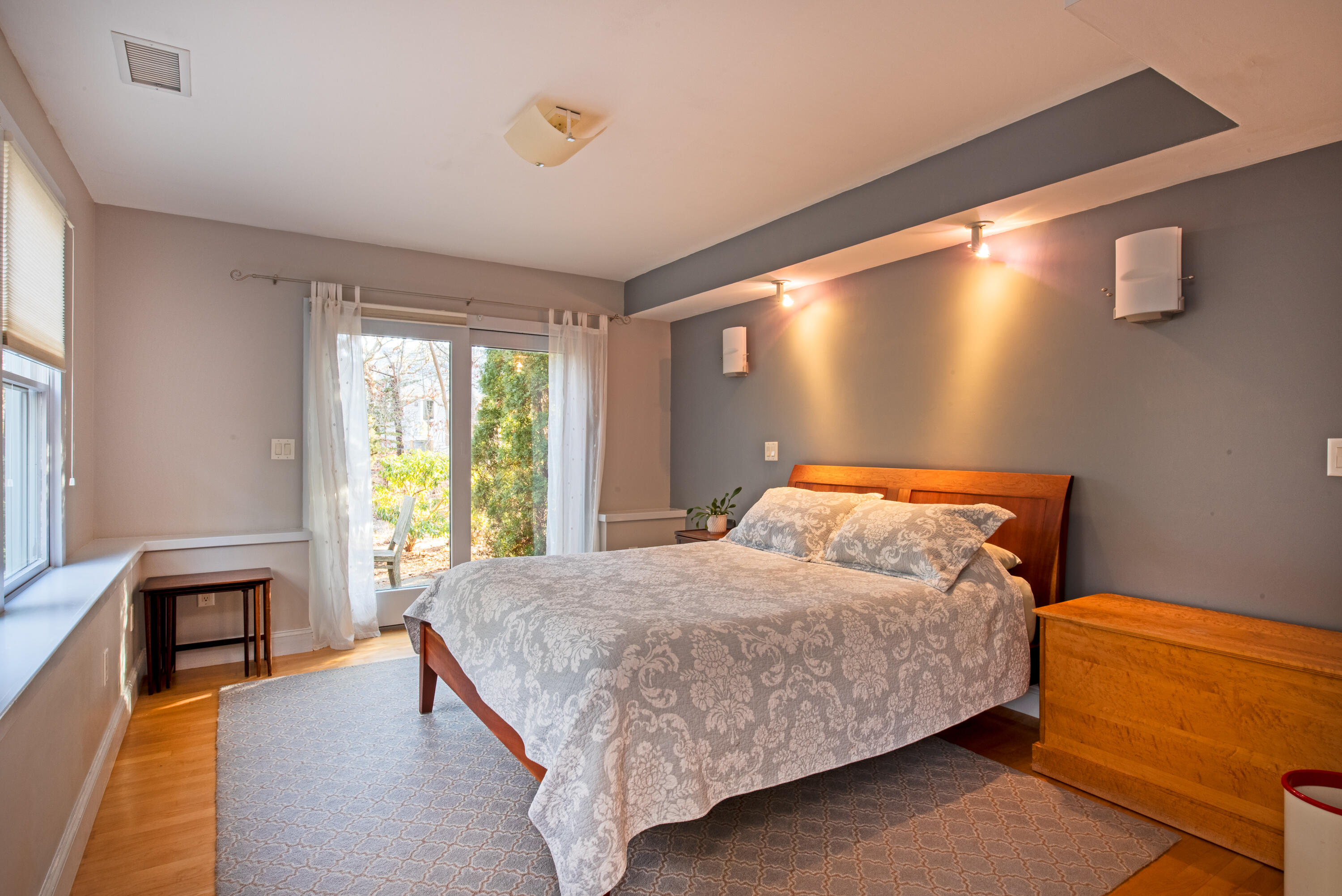 80 Shurtleff Road Eastham, MA 02642 - Photo 25 of 34 a bedroom with a bed and wooden floor