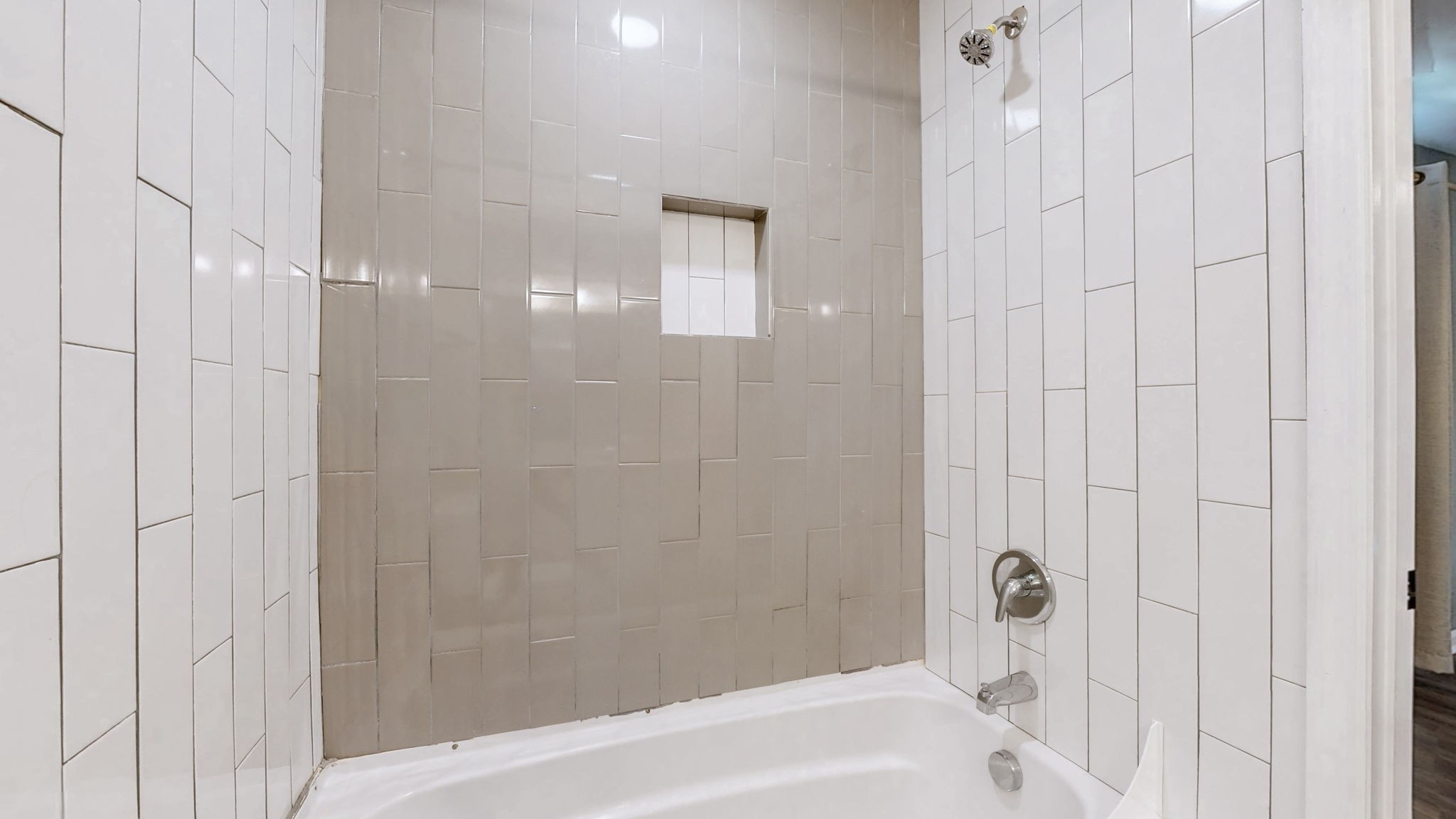 1214 Rutherford Street Murfreesboro, TN 37130 - Photo 17 of 37 a bathroom with a bathtub