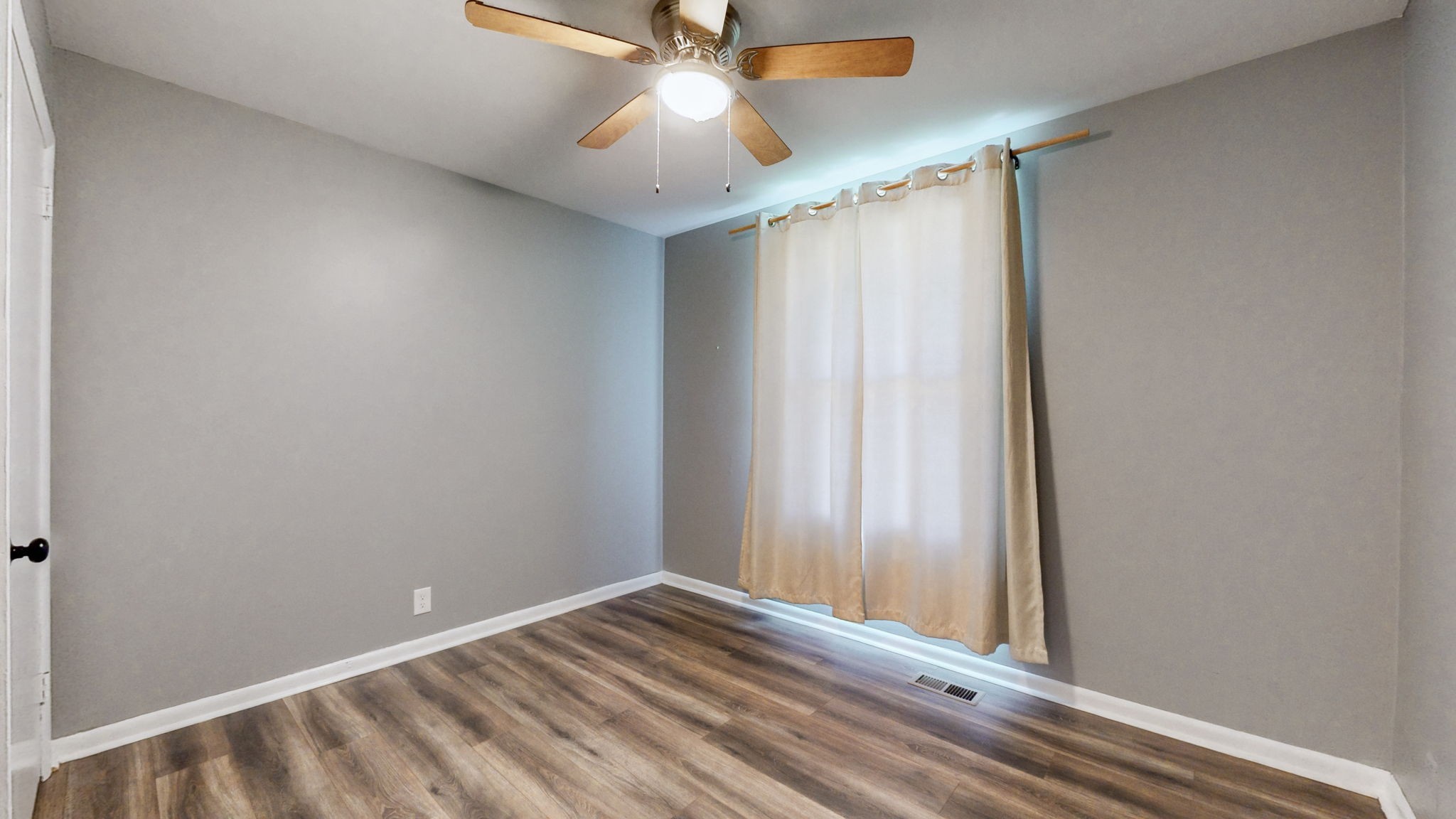 1214 Rutherford Street Murfreesboro, TN 37130 - Photo 19 of 37 a view of room with window and ceiling fan