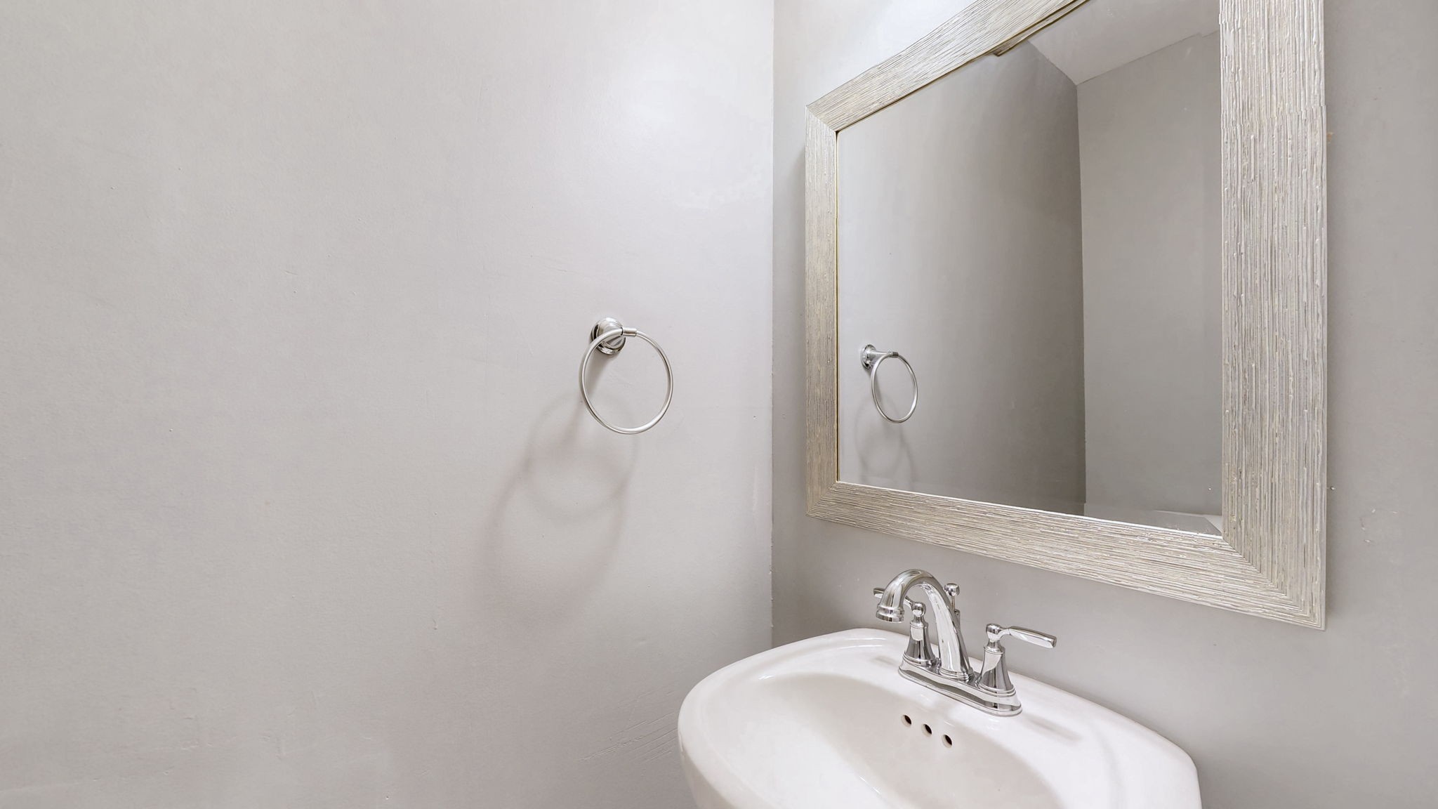 1214 Rutherford Street Murfreesboro, TN 37130 - Photo 23 of 37 a bathroom with a sink and mirror