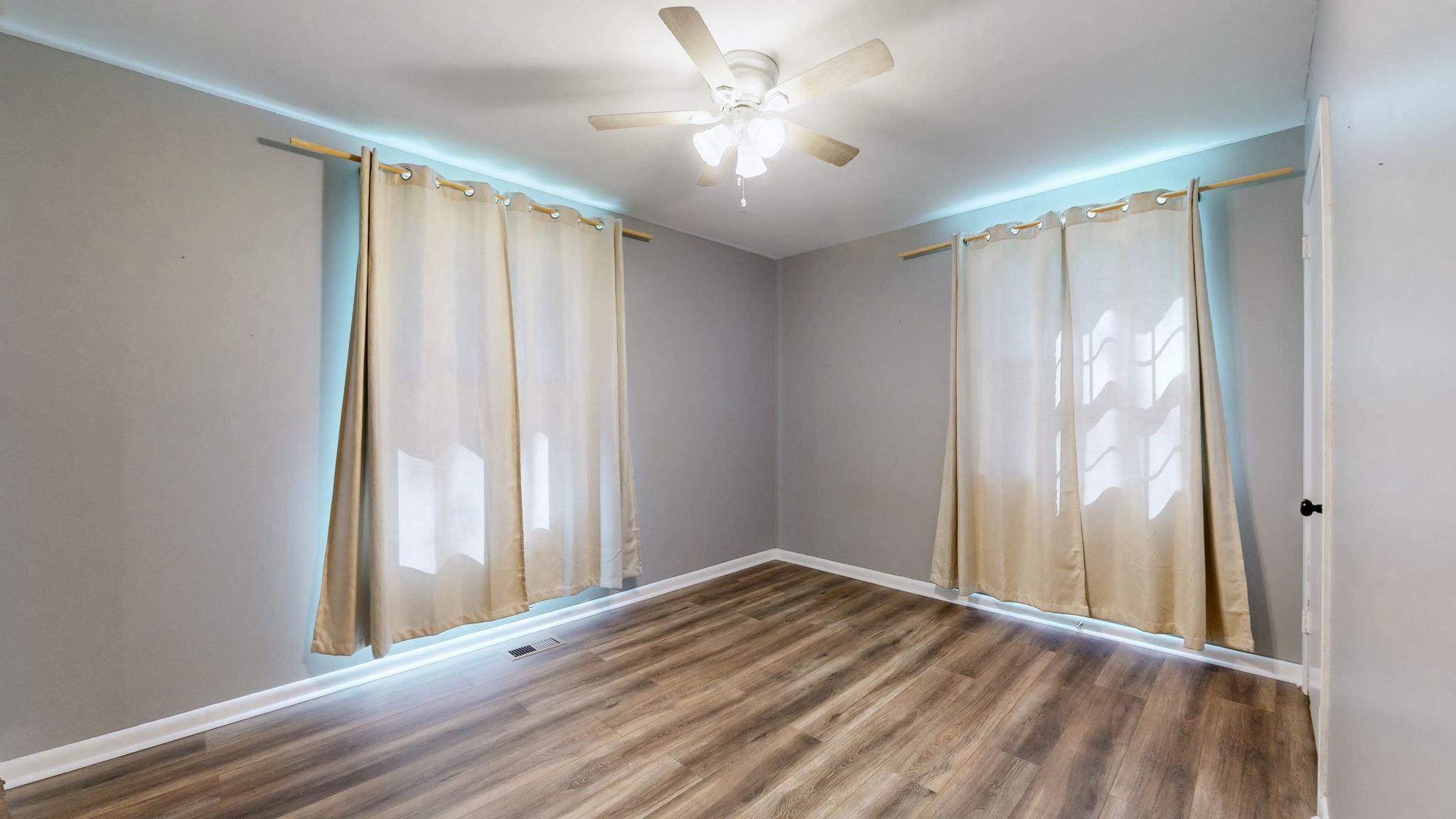 1214 Rutherford Street Murfreesboro, TN 37130 - Photo 24 of 37 a view of a room with wooden floor and a window