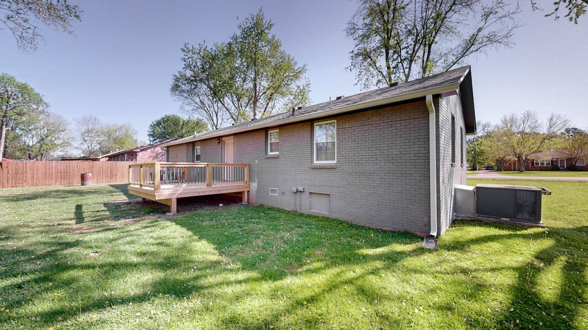 1214 Rutherford Street Murfreesboro, TN 37130 - Photo 27 of 37 a backyard of a house with table and chairs