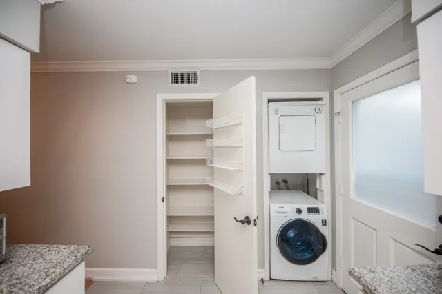 a view of livingroom with washer and dryer