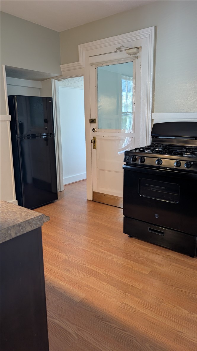 28 Vick Park B Rochester, NY 14607 - Photo 8 of 25 Newer gas range and frig, pantry room in backgroun