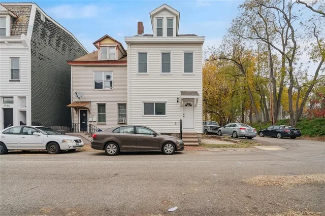 a car parked in front of a house
