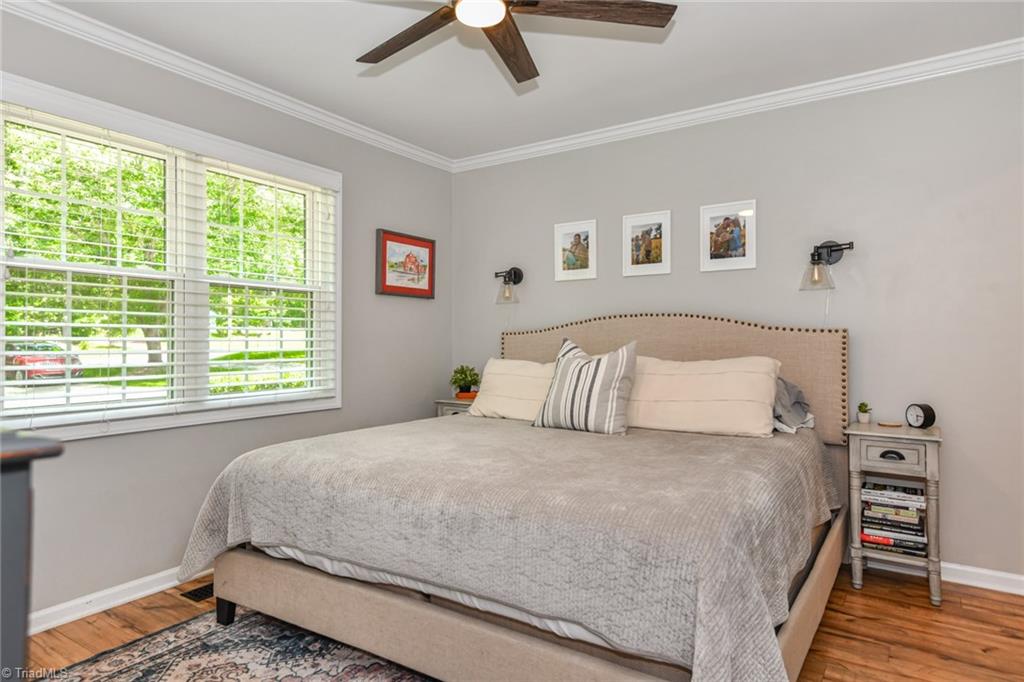 7317 Goodwill Church Road Oak Ridge, NC 27310 - Photo 19 of 39 Primary Bedroom has lots of natural light.