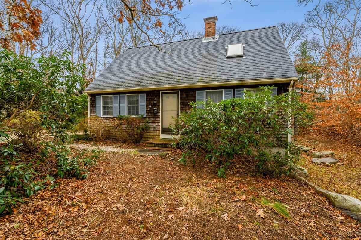 58 Oyster Pond Road Falmouth, MA 02540 - Photo 1 of 30 a front view of a house with garden