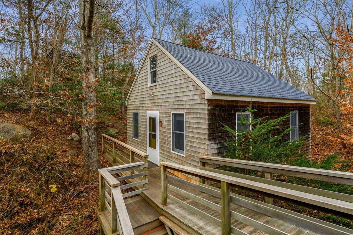 58 Oyster Pond Road Falmouth, MA 02540 - Photo 18 of 30 a view of a house with a large window