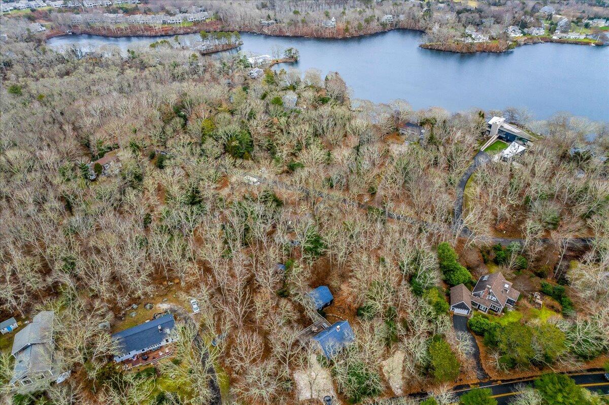 58 Oyster Pond Road Falmouth, MA 02540 - Photo 21 of 30 an aerial view of a house with a yard and lake view