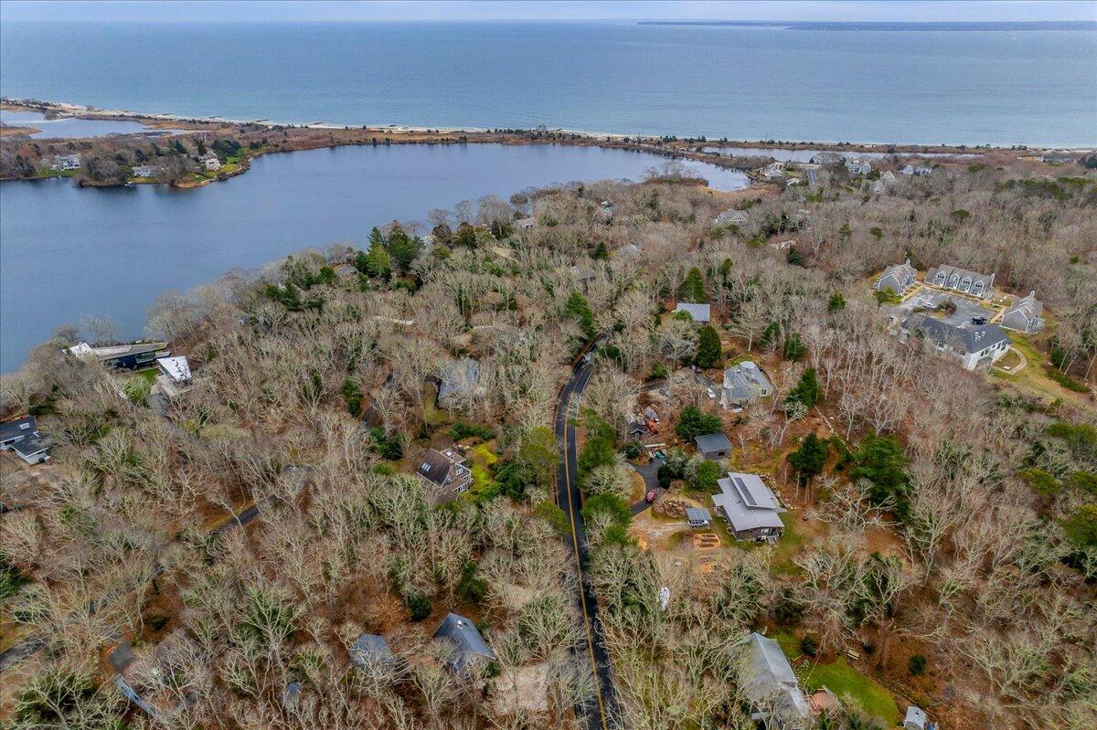 58 Oyster Pond Road Falmouth, MA 02540 - Photo 22 of 30 an aerial view of a houses with a lake view