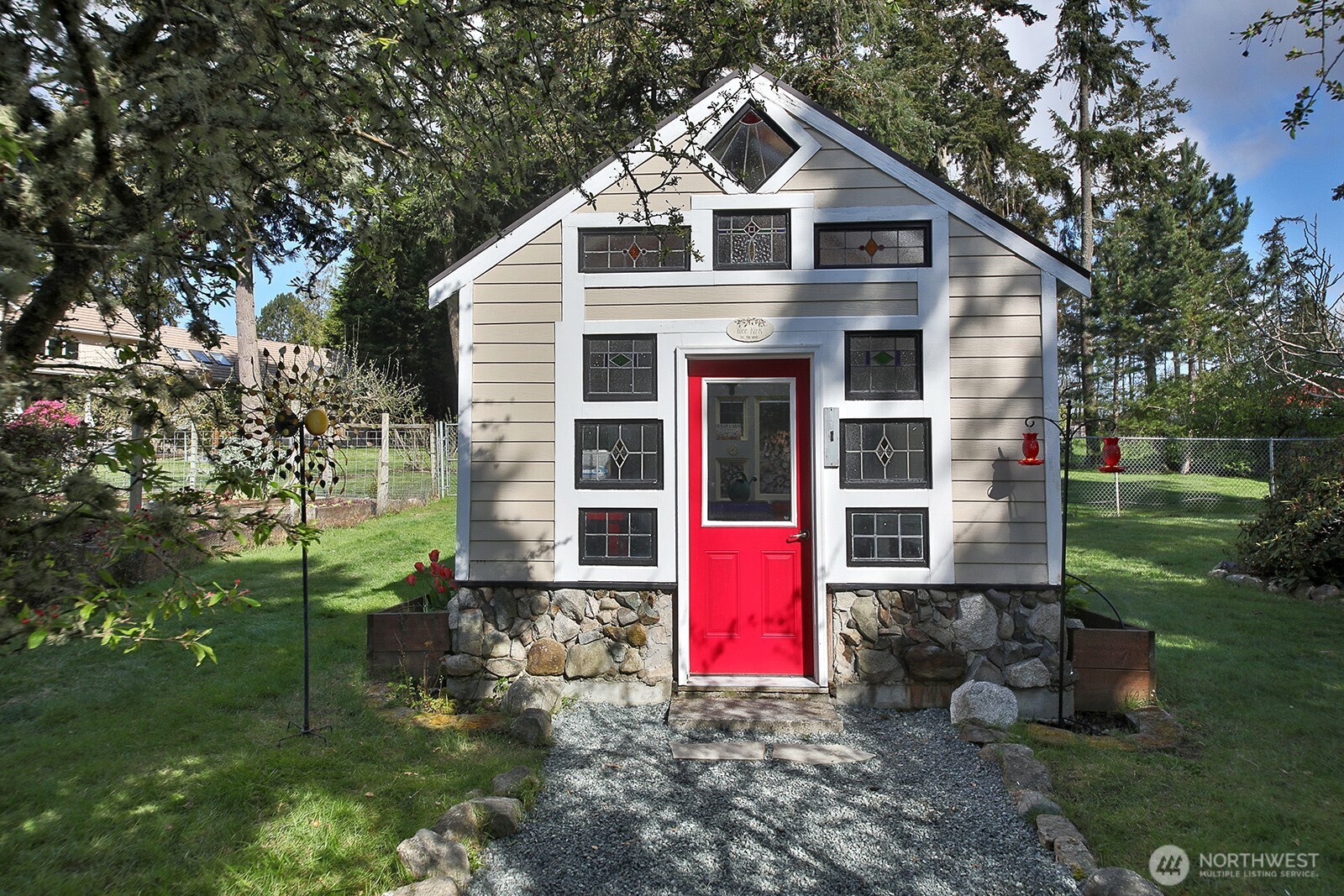 5741 Crow Haven Road Langley, WA 98260 - Photo 13 of 40 a view of a small house with yard