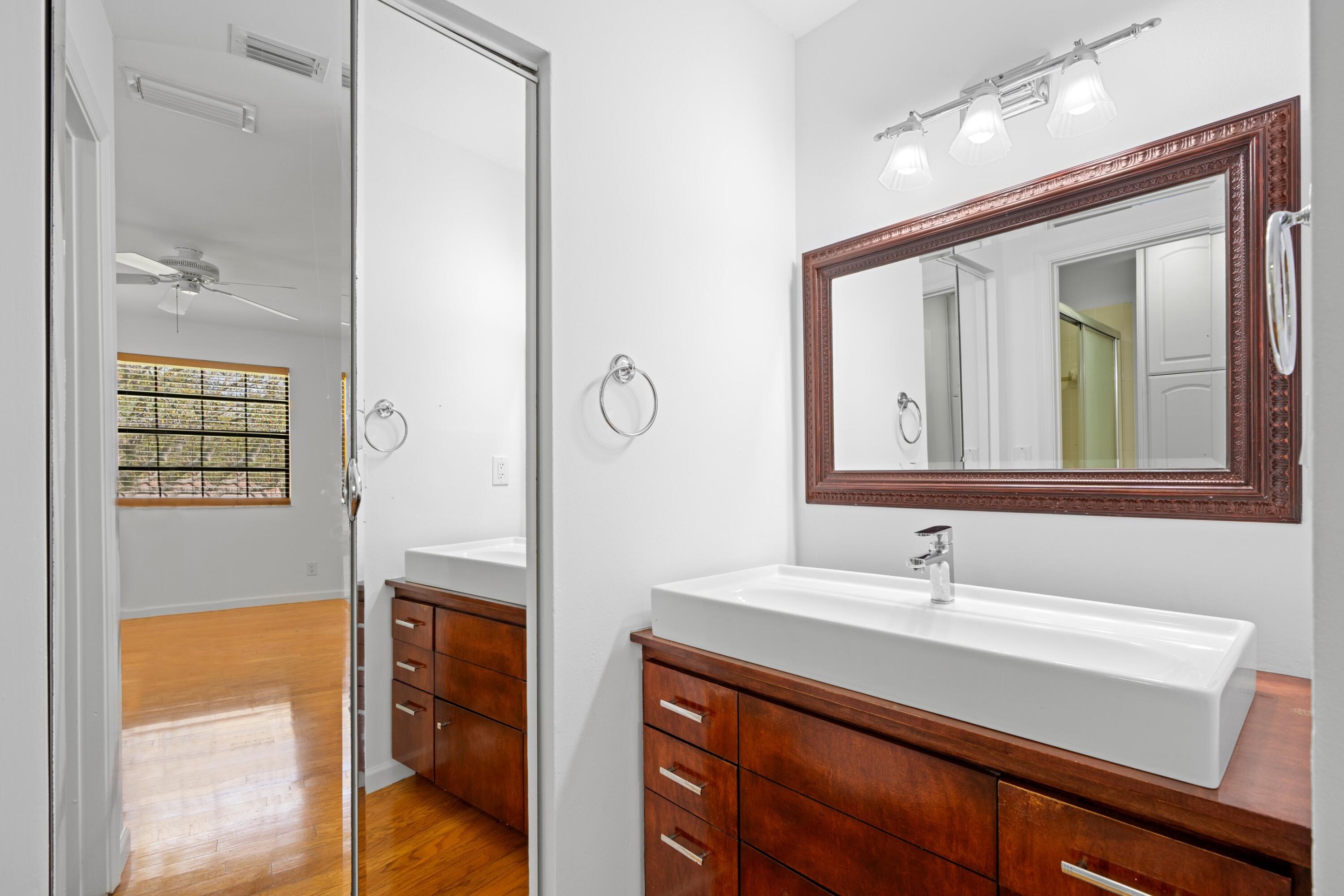 3191 Leewood Terrace, Unit L237 Boca Raton, FL 33431 - Photo 12 of 48 Primary Bathroom