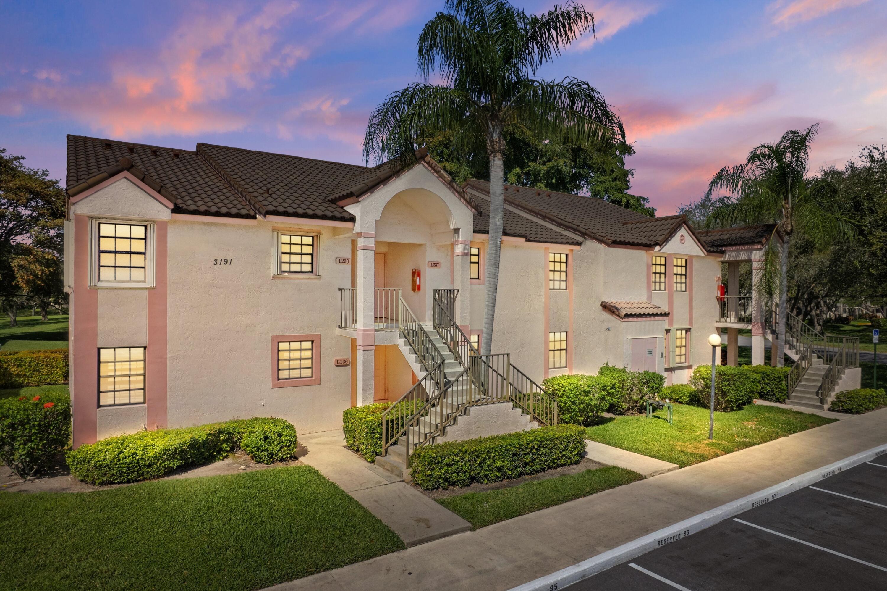 3191 Leewood Terrace, Unit L237 Boca Raton, FL 33431 - Photo 2 of 48 Twilight Exterior