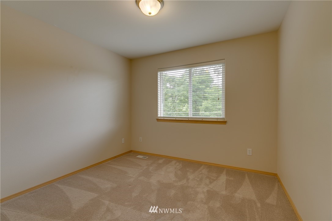 23034 12th Drive Southeast Bothell, WA 98021 - Photo 20 of 32 an empty room with windows