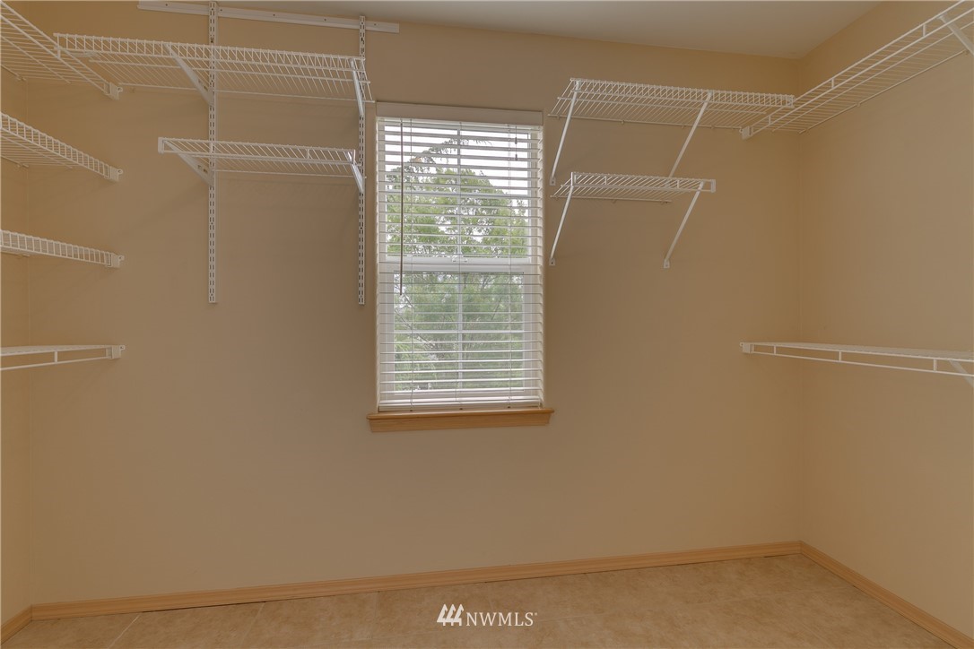 23034 12th Drive Southeast Bothell, WA 98021 - Photo 26 of 32 a view of a small space with wooden floor and a window