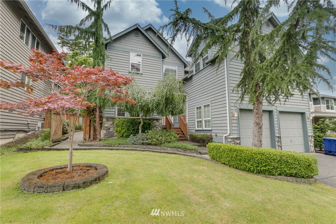 23034 12th Drive Southeast Bothell, WA 98021 - Photo 32 of 32 a front view of a house with a yard
