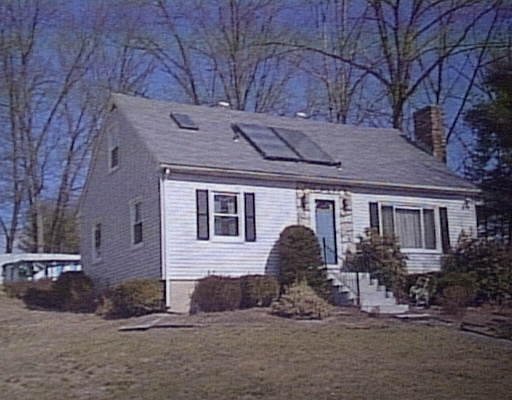 91 Westhampton Road Northampton, MA 01062 - Photo 1 of 2 a front view of a house with garden