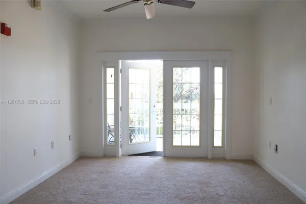 an empty room with windows