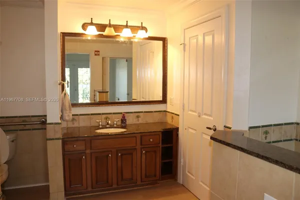 a bathroom with a shower and toilet