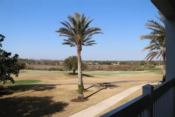 a view of a lake with a beach