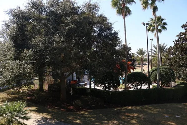 a stove top oven sitting inside of a kitchen