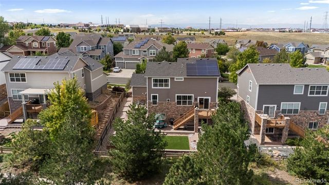 an aerial view of a house with a lake view