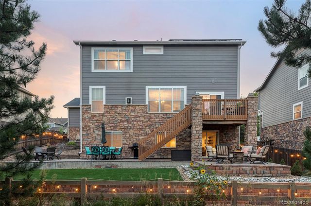 a view of a house with a street