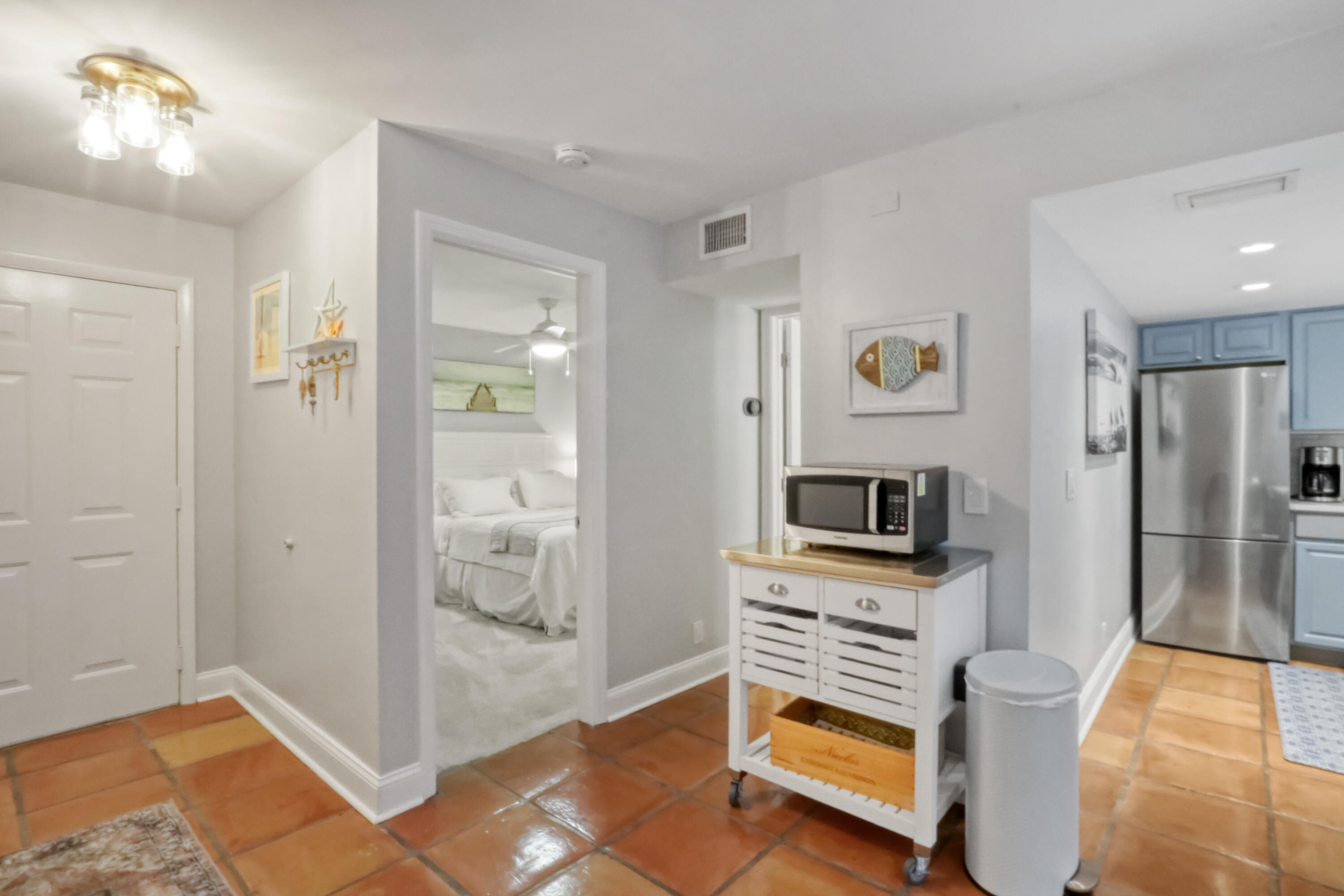 1605 Highway 1, Unit M2213 Jupiter, FL 33477 - Photo 5 of 36 Bedroom-Kitchen-Guest Bathroom