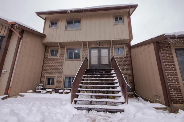 a view of a house with stairs