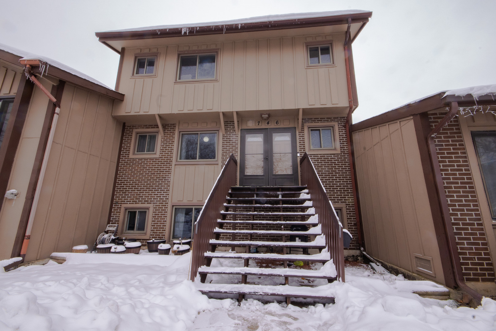 746 East Devon Avenue Roselle, IL 60172 - Photo 1 of 24 a view of a house with stairs